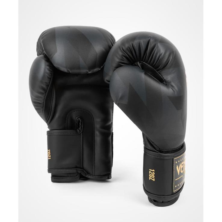 Venum Razor boxing gloves black / gold